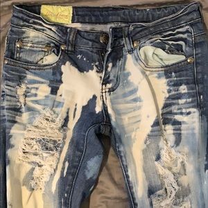 Acid washed ripped jeans